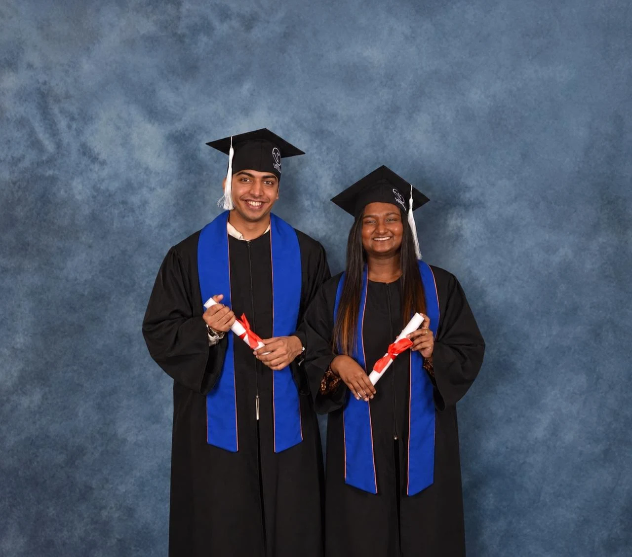 Alma and Abhishek graduating together